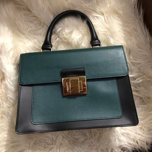 Green and black handbag